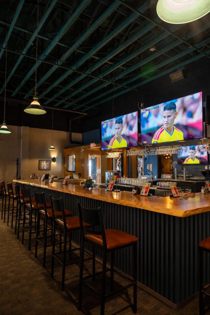 Full-service bar in the lounge at Jackpot Grill, Grande Prairie